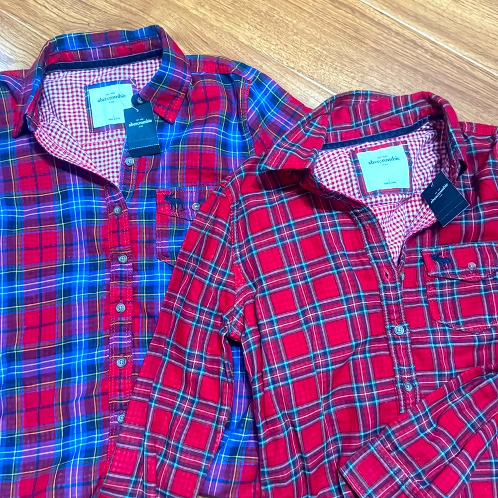 Set of 2 new holidays shirts.